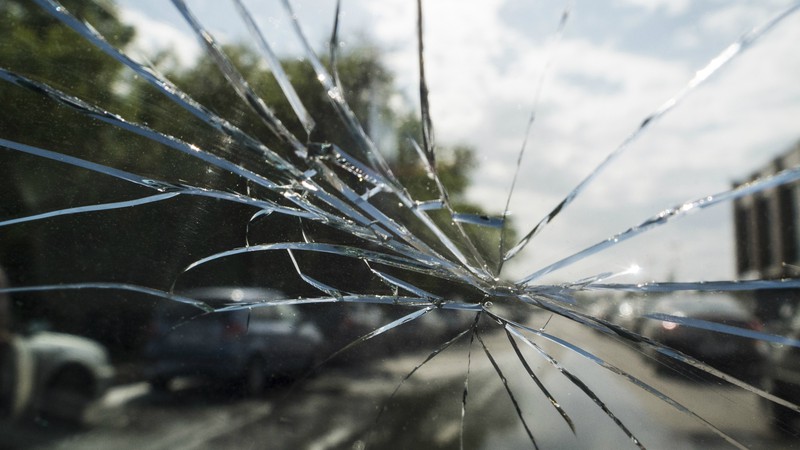 Сracks on the windshield of the car